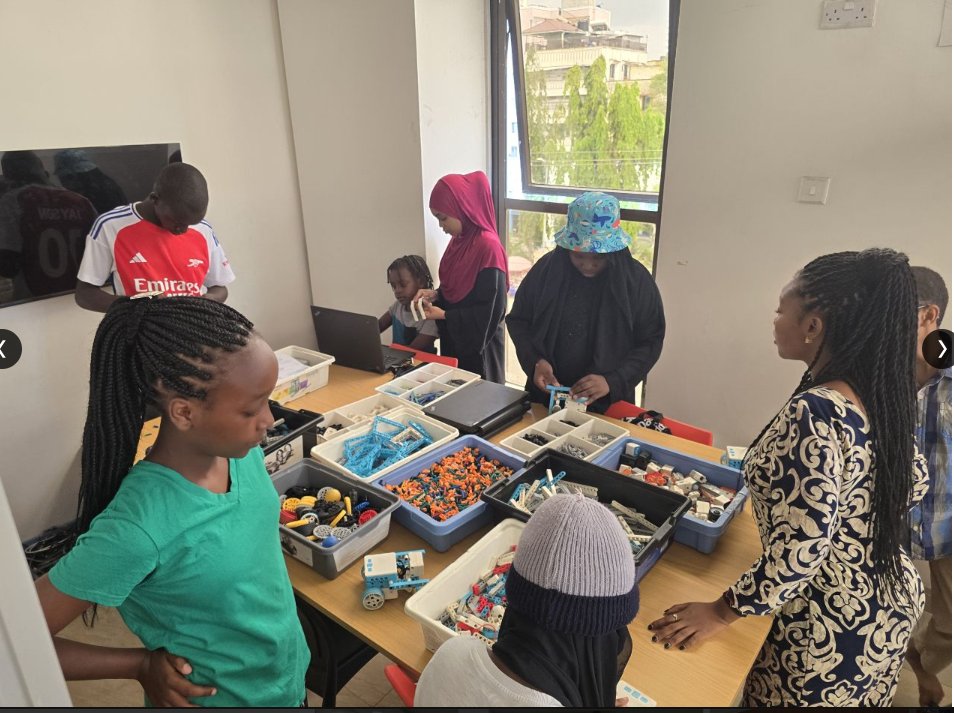 Learners building robotics kits at the Fun STEM Camp in Mombasa
